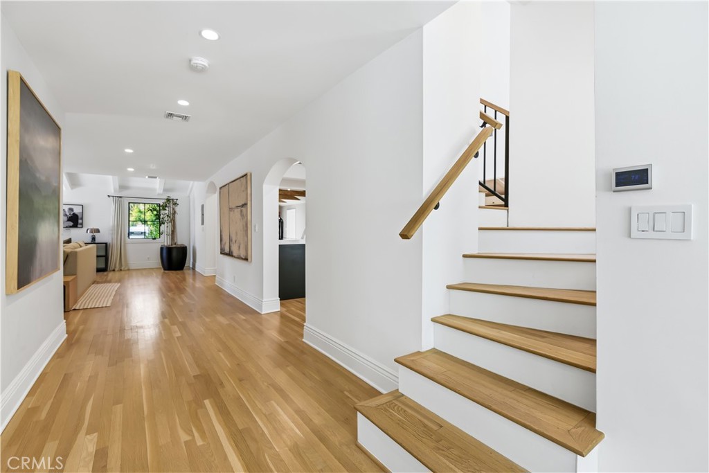 5460 Round Meadow Road Hidden Hills, CA 91302 - Photo 10 of 29 a view of entryway and hall with wooden floor