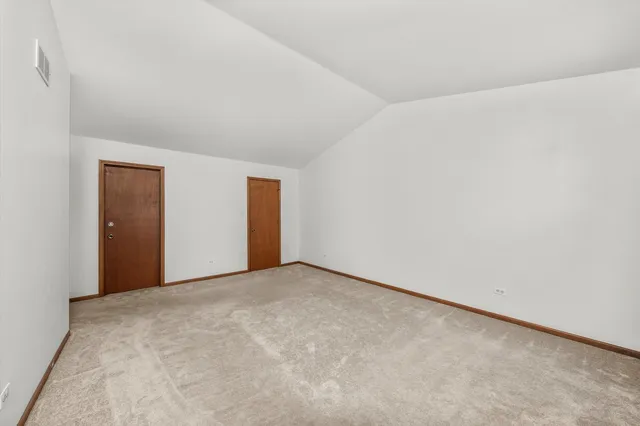 an empty room with an entryway