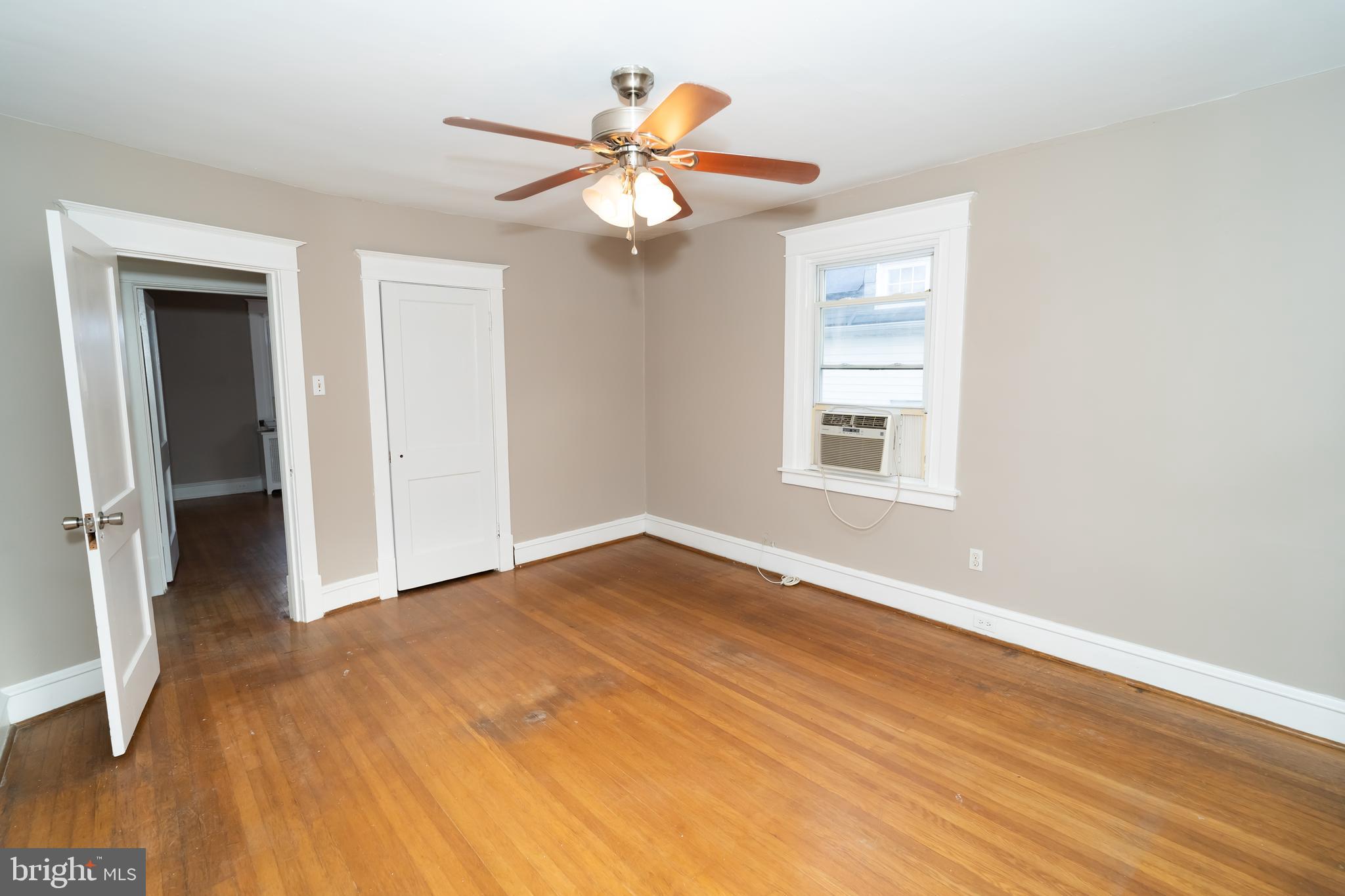 7209 Hazel Avenue Upper Darby, PA 19082 - Photo 22 of 35 a view of empty room with wooden floor