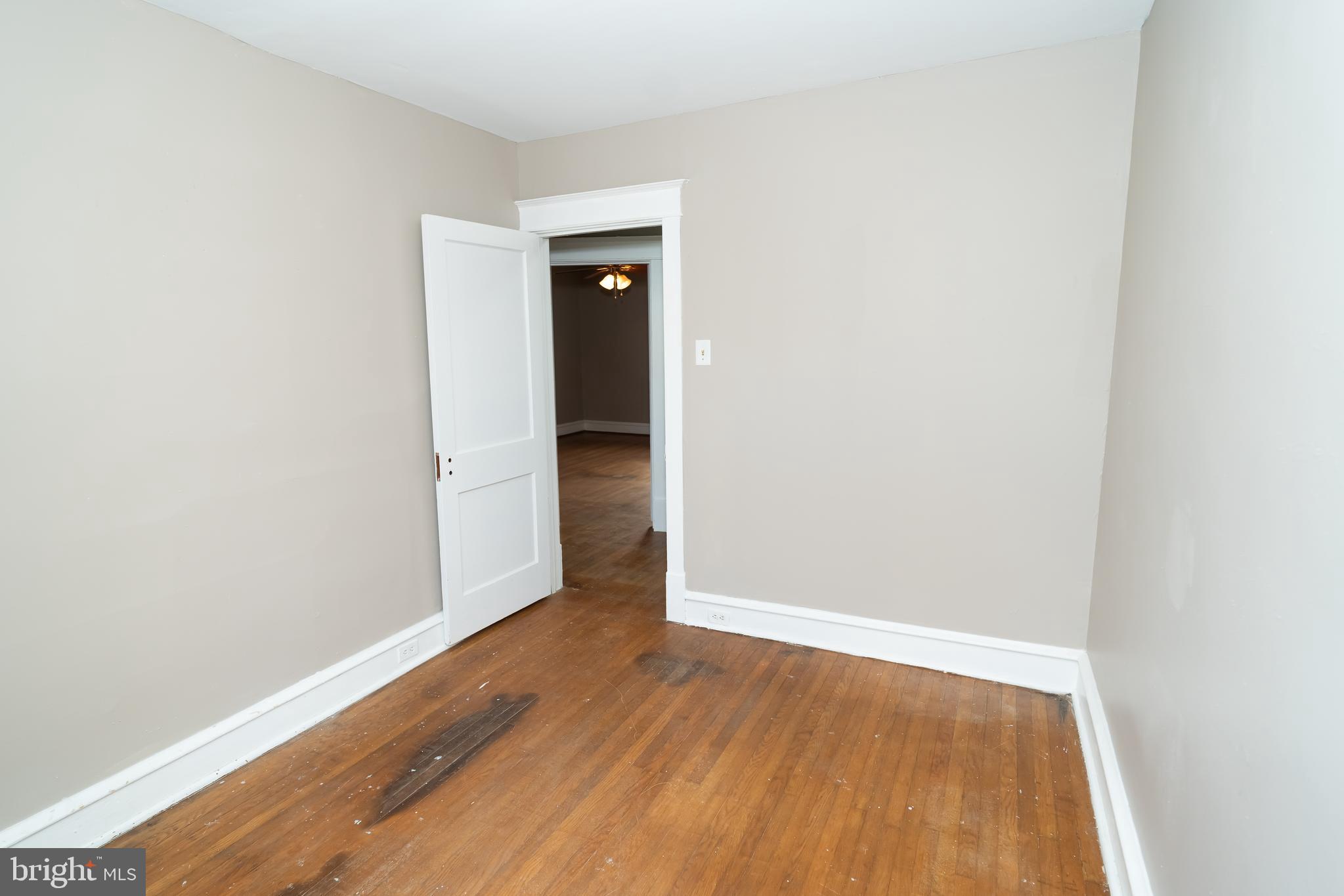 7209 Hazel Avenue Upper Darby, PA 19082 - Photo 23 of 35 a view of an empty room with wooden floor