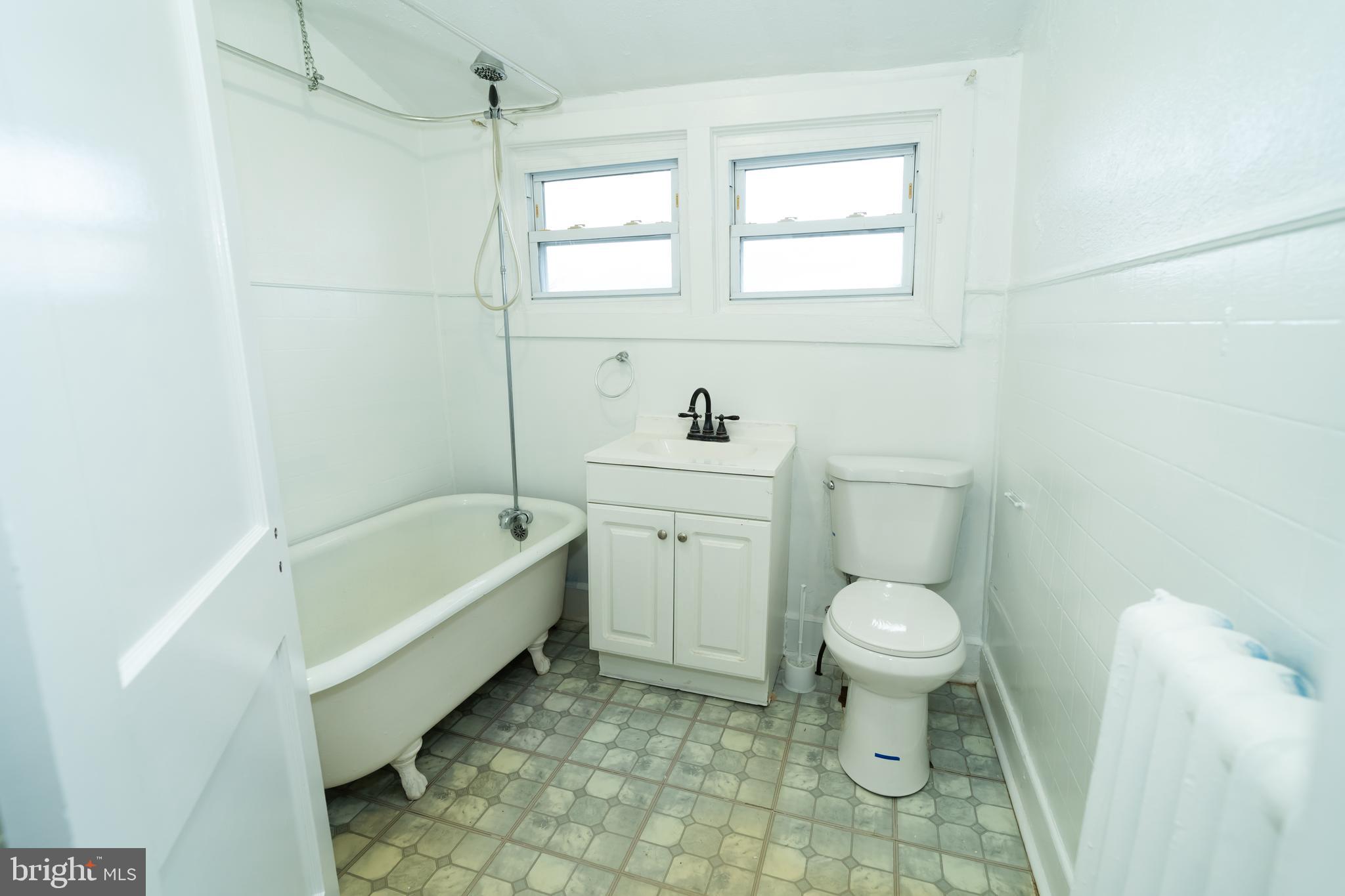 7209 Hazel Avenue Upper Darby, PA 19082 - Photo 30 of 35 a bathroom with a sink toilet and bathtub