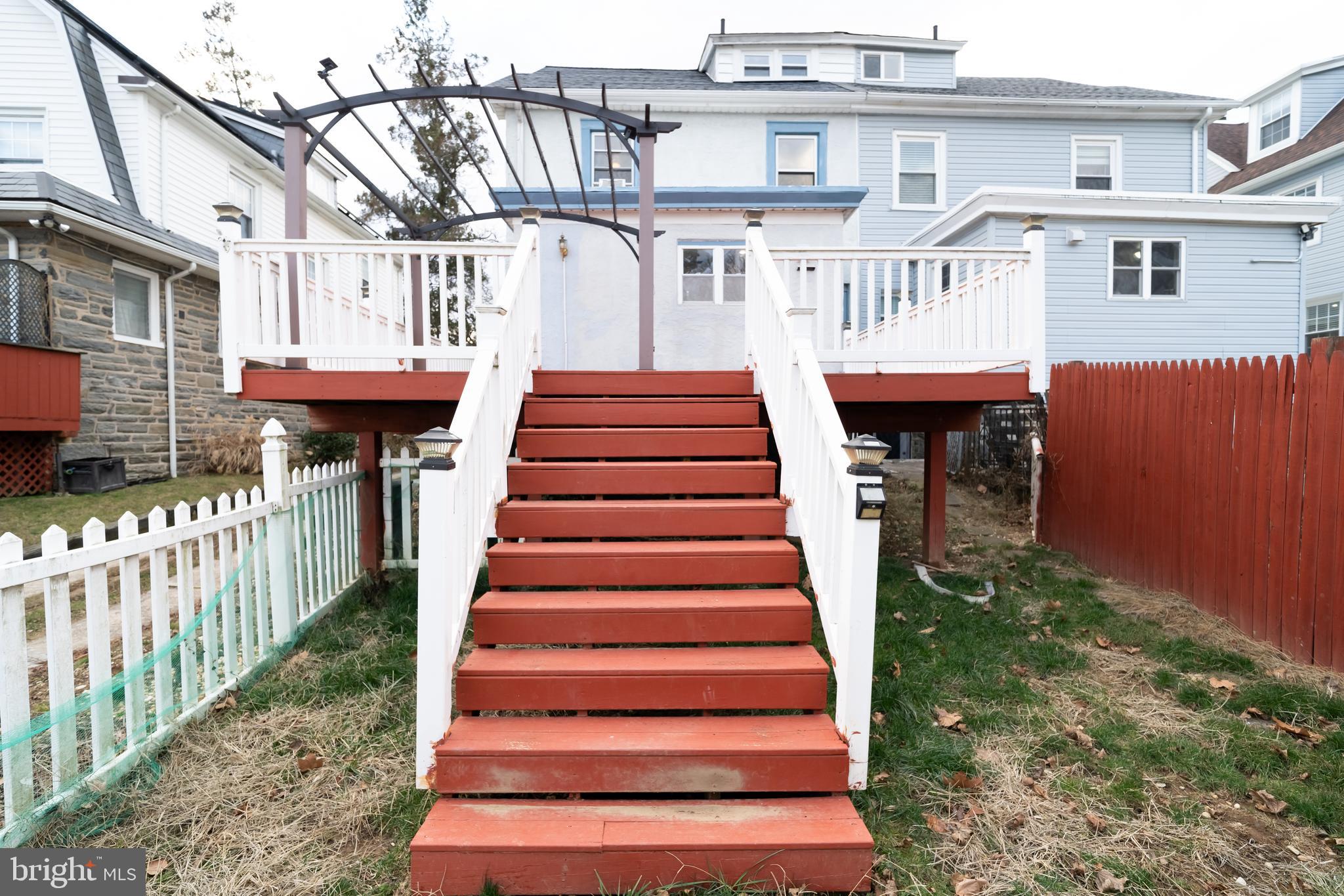7209 Hazel Avenue Upper Darby, PA 19082 - Photo 33 of 35 a view of a house with wooden fence and a porch