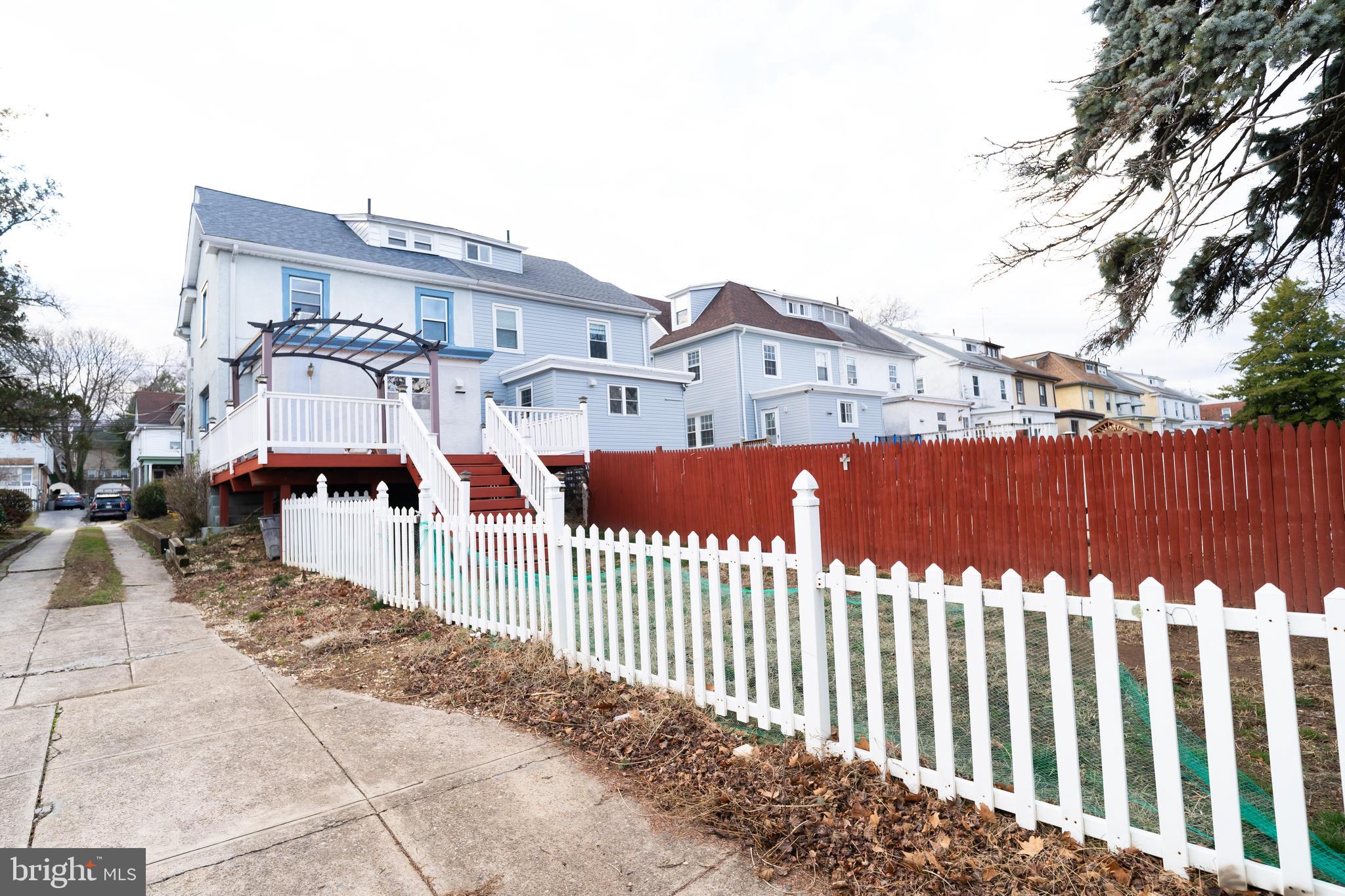 7209 Hazel Avenue Upper Darby, PA 19082 - Photo 6 of 35 a front view of a house with wooden fence