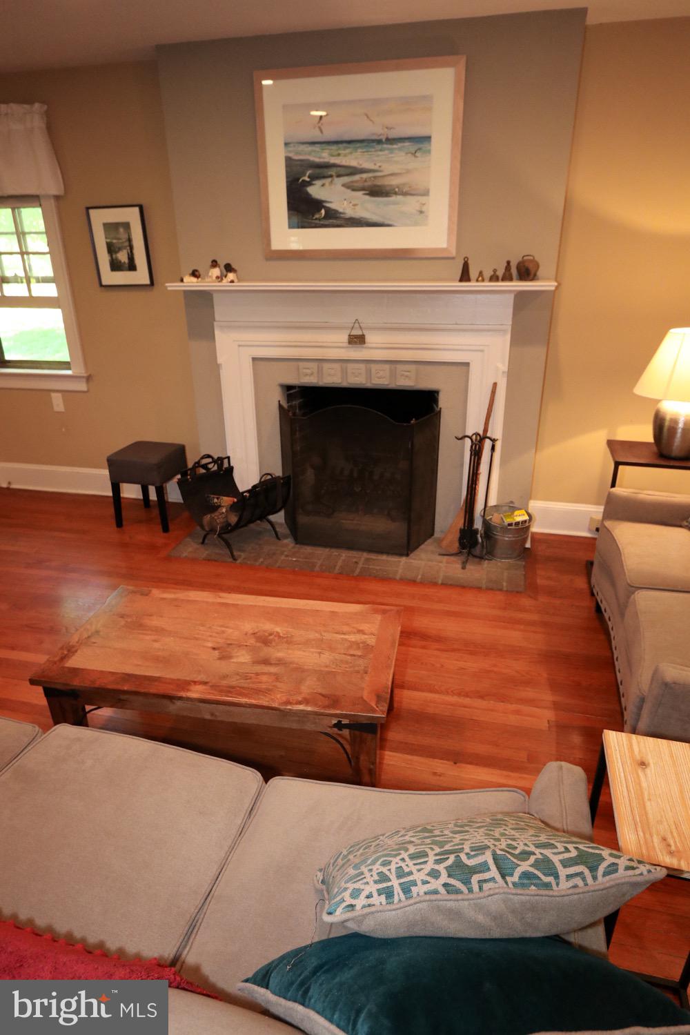 2701 Alden Road Bryn Athyn, PA 19006 - Photo 49 of 105 a living room with furniture a fireplace and a fireplace