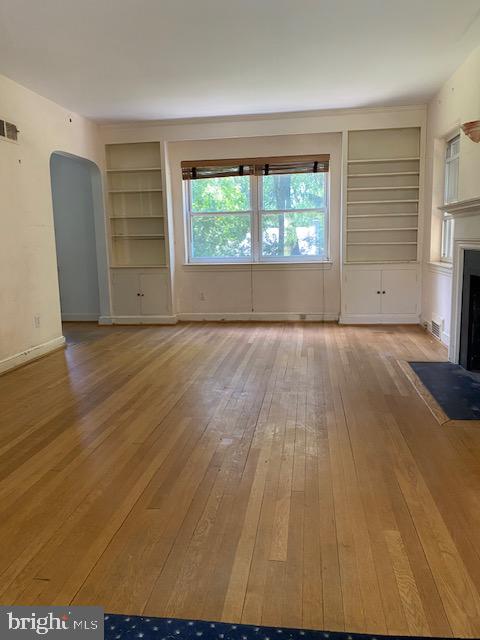 5707 Harwick Road Bethesda, MD 20816 - Photo 3 of 32 Living Room w/hardwood floors, wood burning FP.
