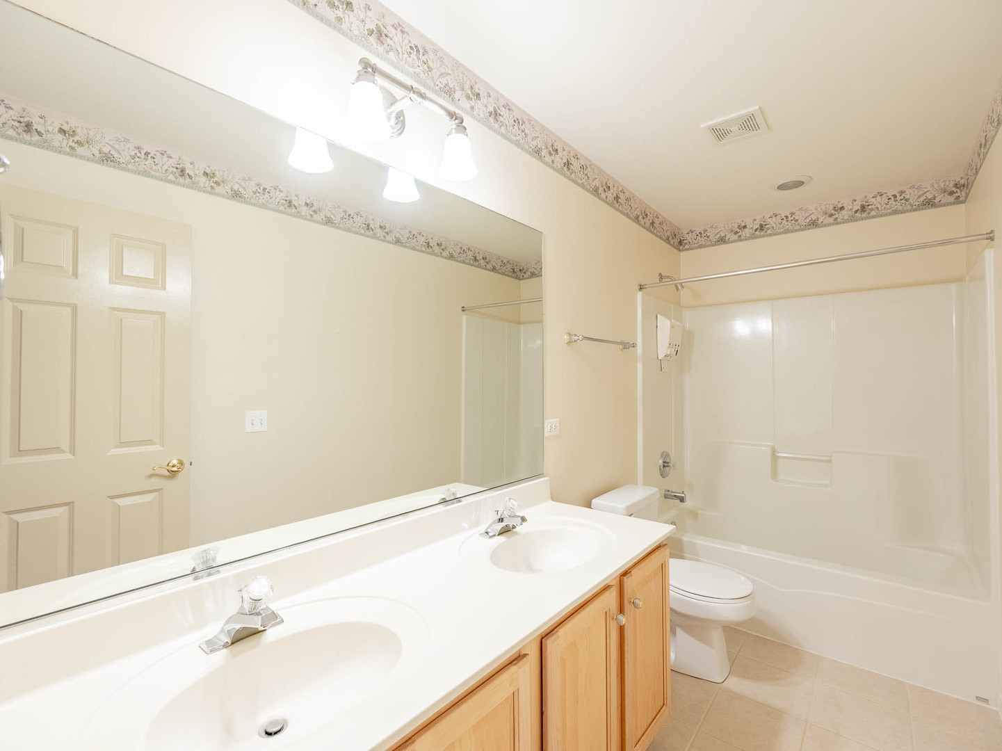 254 Ridge Road North Aurora, IL 60542 - Photo 12 of 14 a bathroom with a sink a toilet and shower