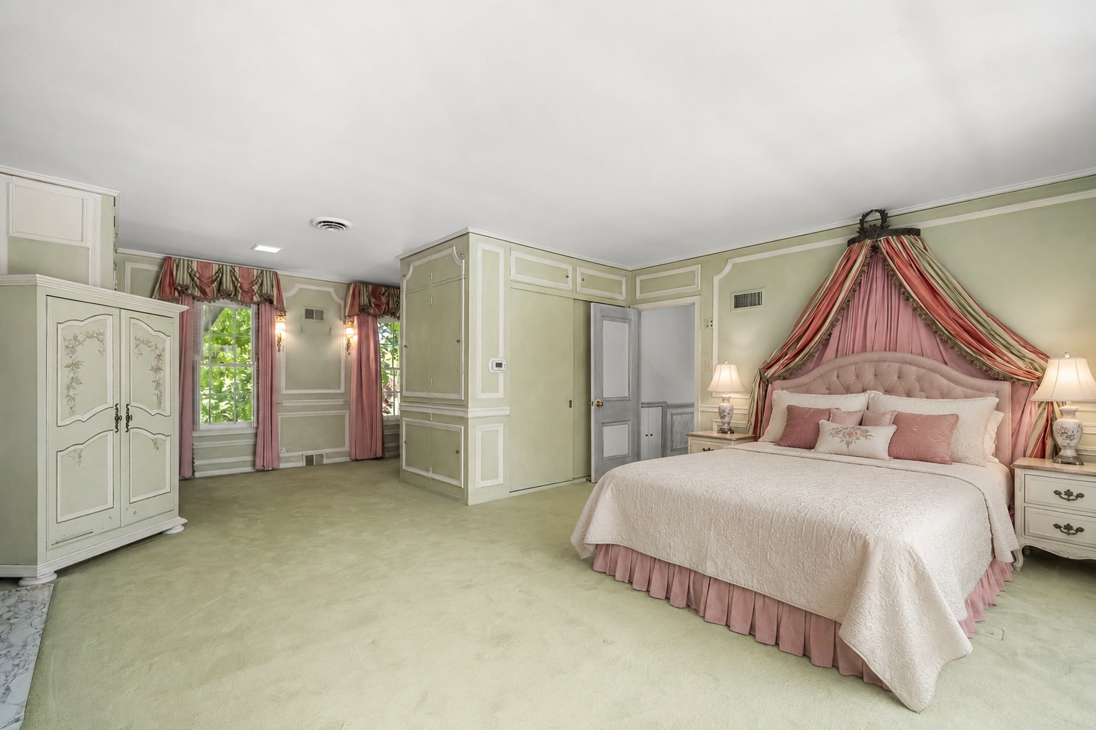 33W451 Surrey Road Wayne, IL 60184 - Photo 33 of 41 a spacious bedroom with a bed and a chandelier
