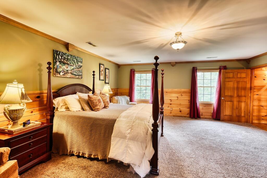 1705 Barberry Road Southeast Floyd, VA 24091 - Photo 16 of 66 a bed room with a bed and a television