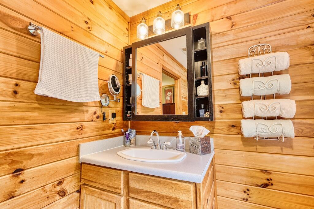 1705 Barberry Road Southeast Floyd, VA 24091 - Photo 19 of 66 a bathroom with a sink and a mirror