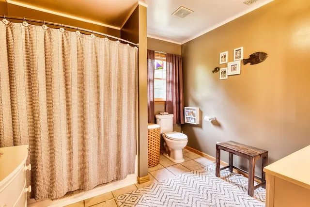 a bathroom with a sink vanity and a mirror