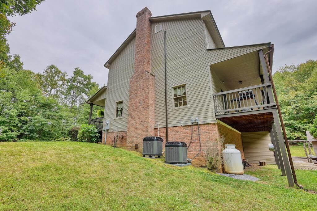 1705 Barberry Road Southeast Floyd, VA 24091 - Photo 36 of 66 a front view of a house with garden