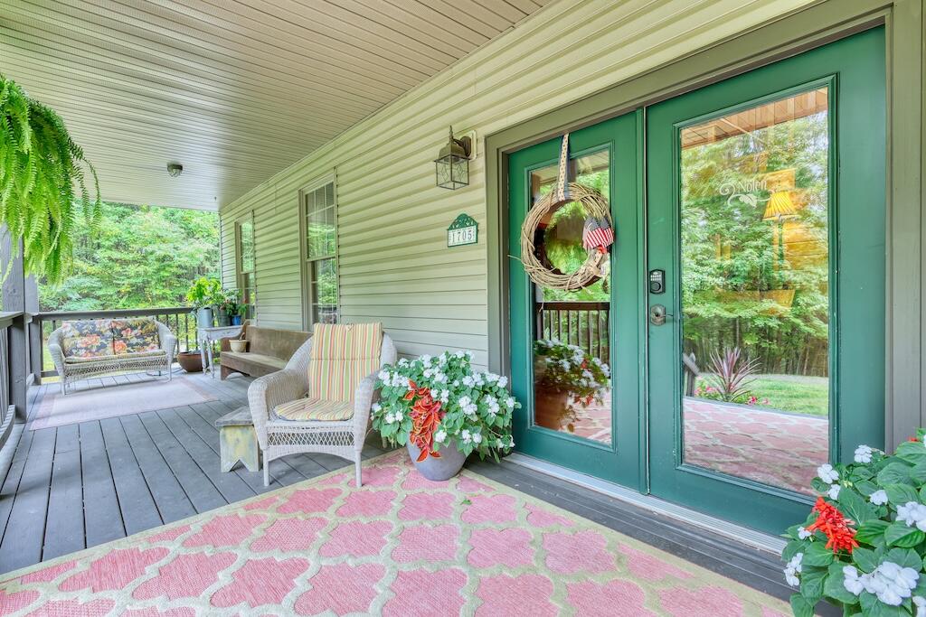 1705 Barberry Road Southeast Floyd, VA 24091 - Photo 6 of 66 a front view of a house with garden