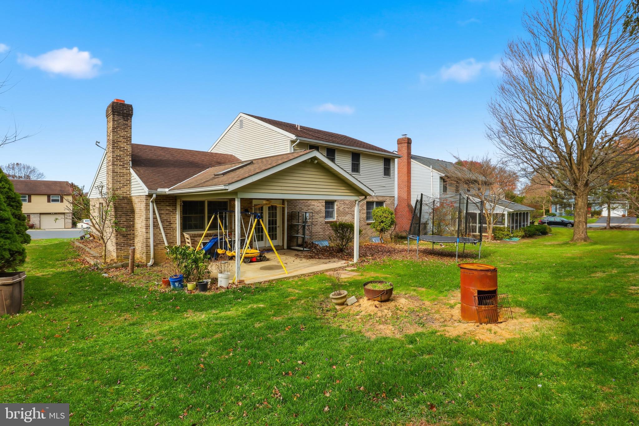 647 Candlewyck Road Lancaster, PA 17601 - Photo 41 of 59 a front view of a house with a yard and trees