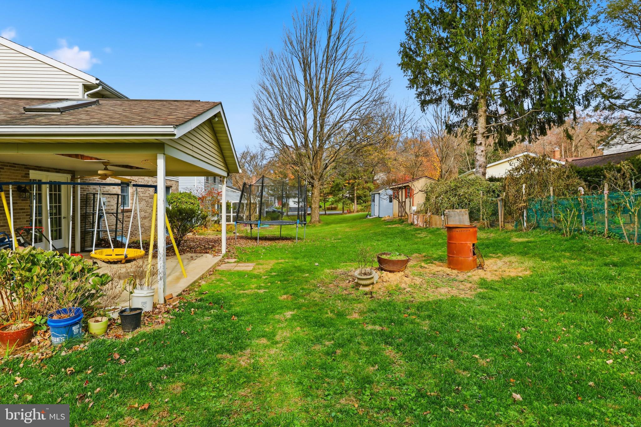 647 Candlewyck Road Lancaster, PA 17601 - Photo 43 of 59 a view of a house with backyard sitting area and garden
