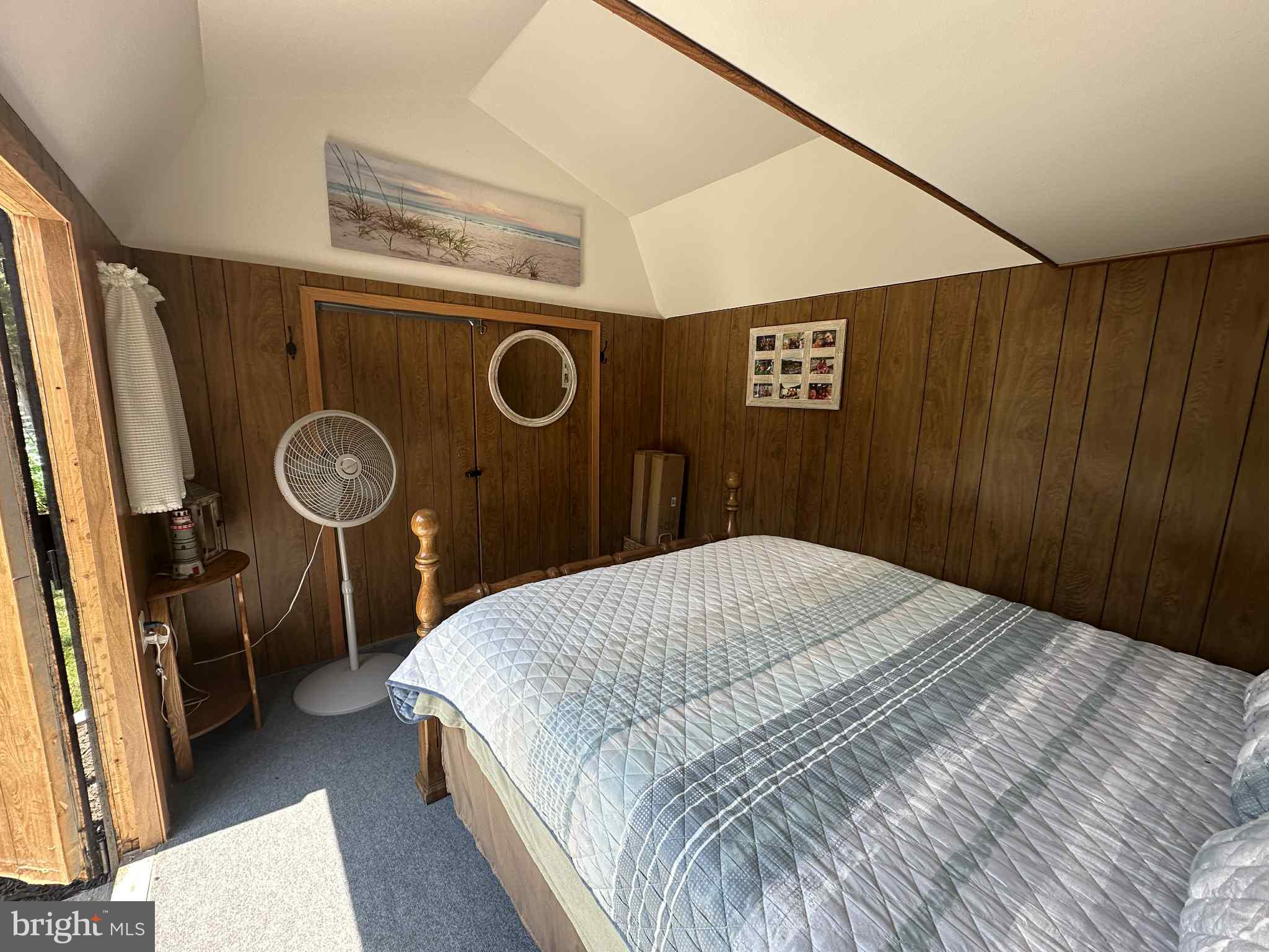 28 & 29 Ranger Road Falling Waters, WV 25419 - Photo 25 of 35 a bedroom with a bed and a mirror