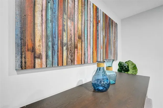 a close view of a glass door and chair