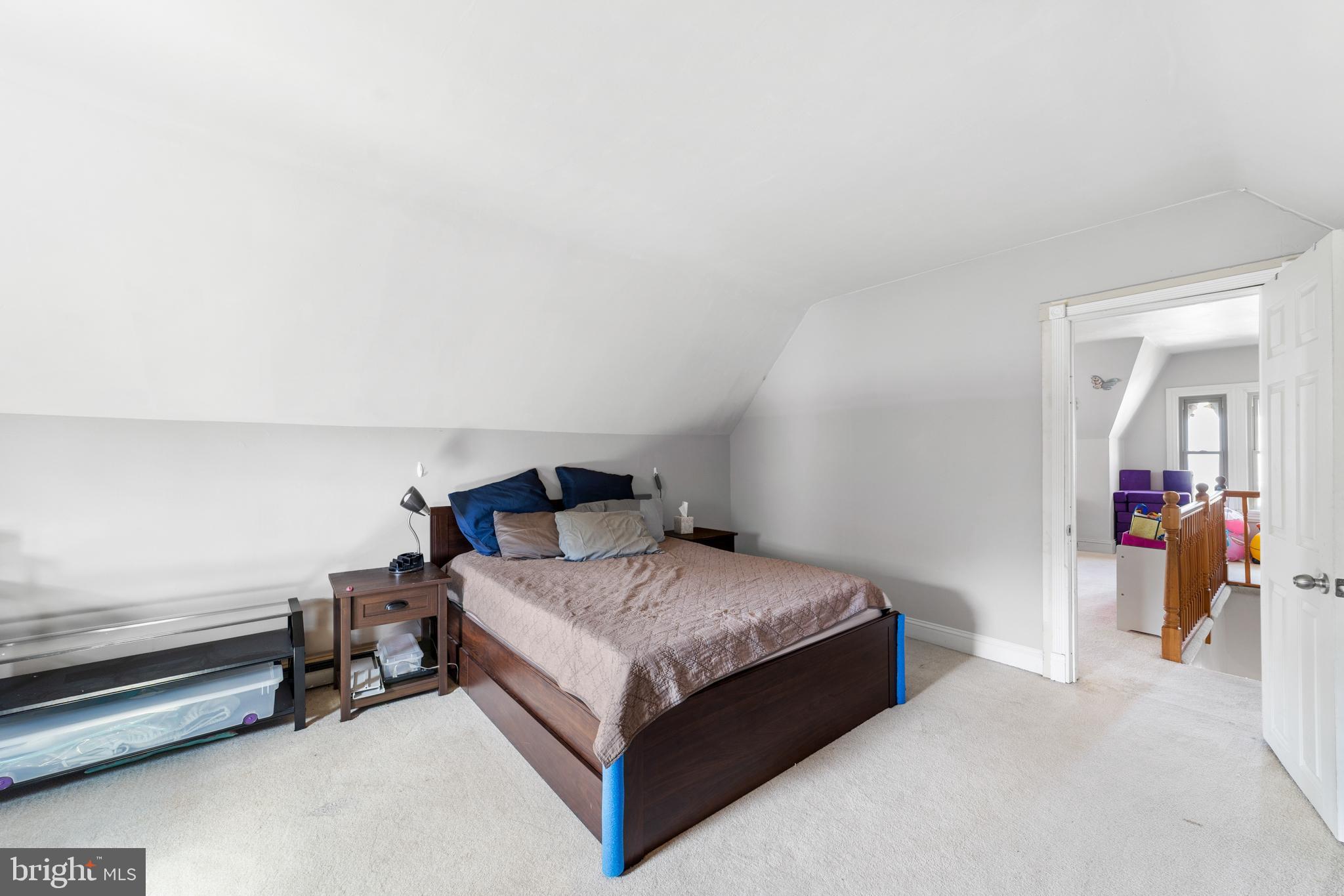 118 Pearl Street Mount Holly, NJ 08060 - Photo 15 of 23 a bedroom with a bed and a lamp