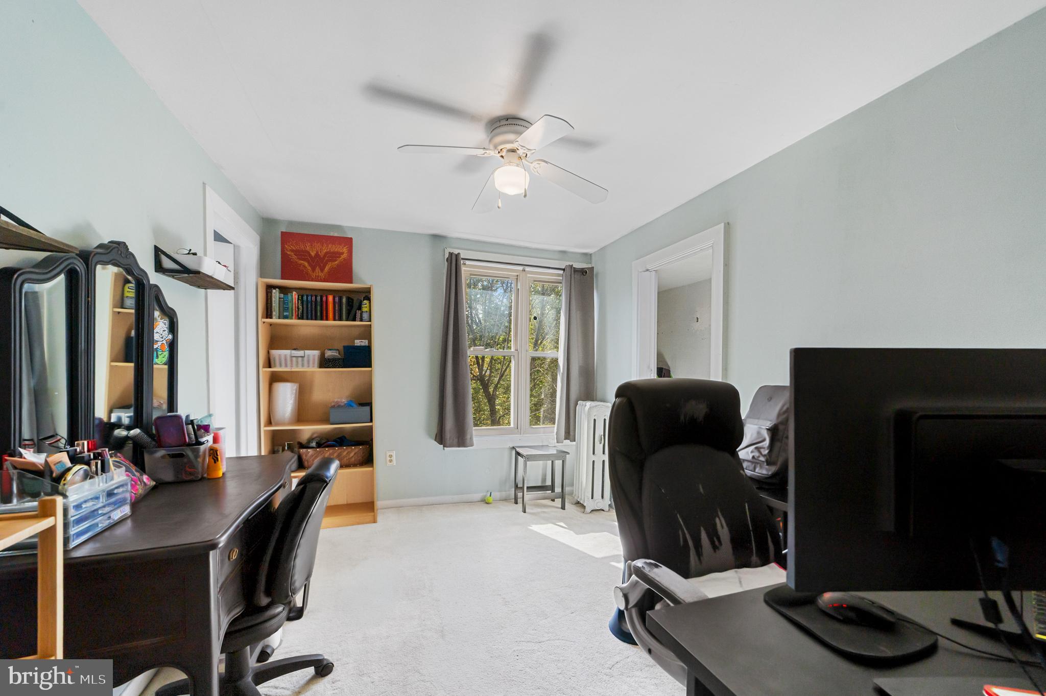 118 Pearl Street Mount Holly, NJ 08060 - Photo 16 of 23 a view of a livingroom with workspace and a window