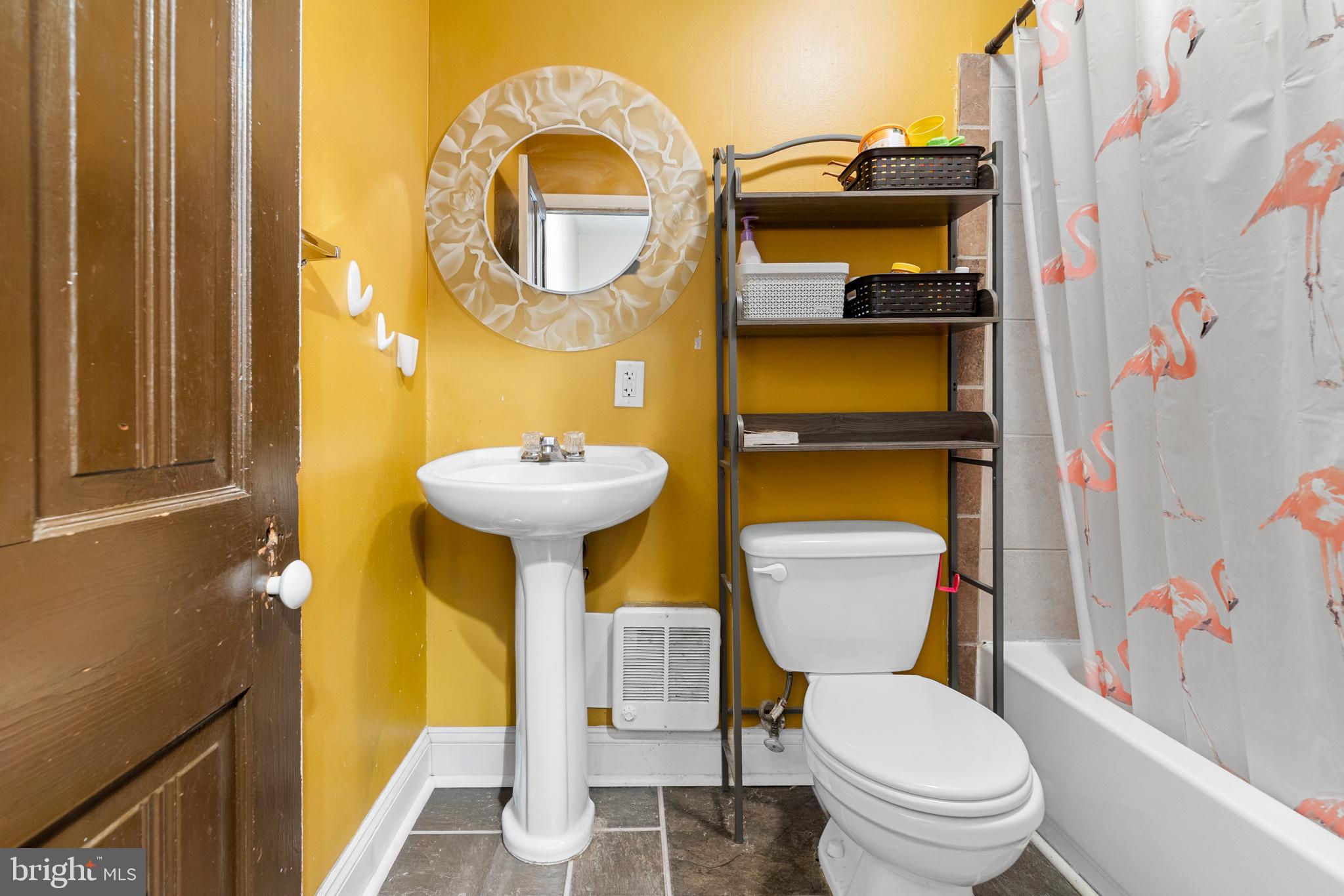 118 Pearl Street Mount Holly, NJ 08060 - Photo 20 of 23 a bathroom with a sink and a mirror