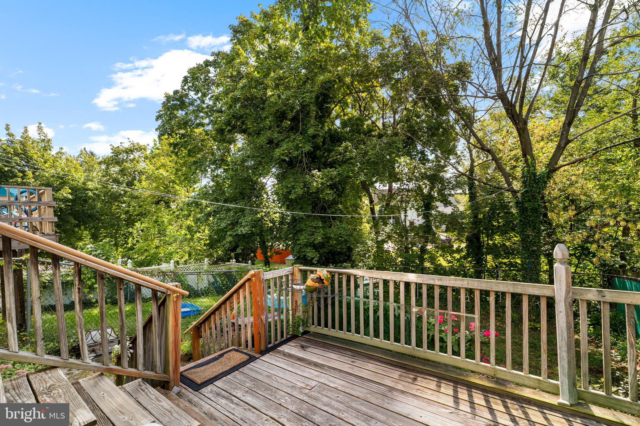 118 Pearl Street Mount Holly, NJ 08060 - Photo 23 of 23 a view of balcony with wooden floor and fence