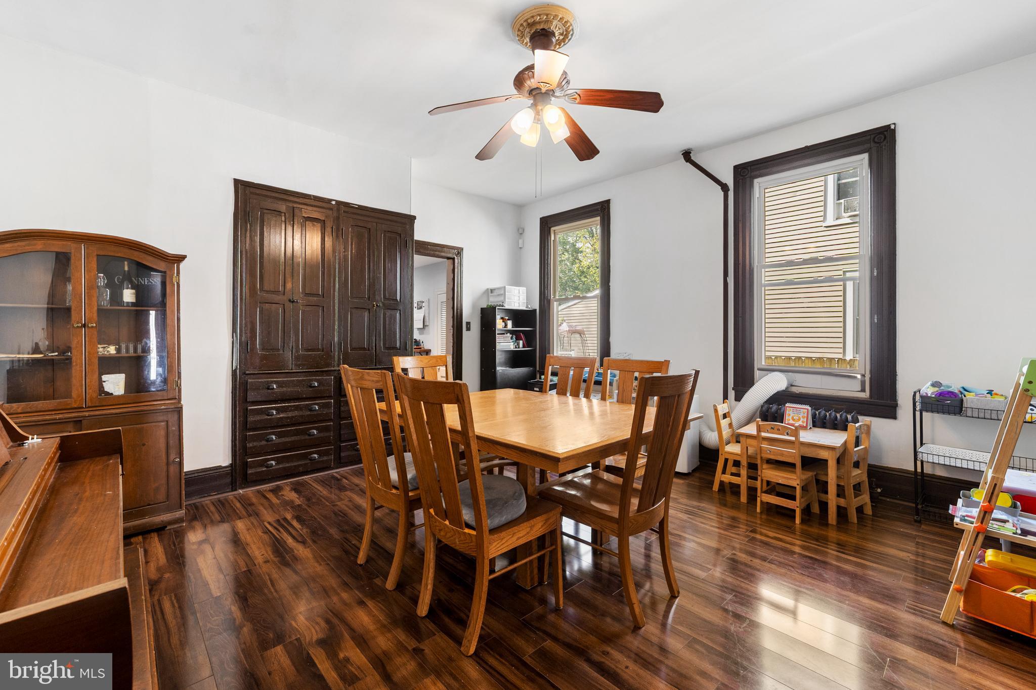 118 Pearl Street Mount Holly, NJ 08060 - Photo 9 of 23 a dining room with furniture window and wooden floor