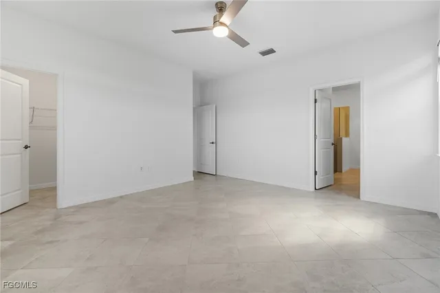 an empty room with windows