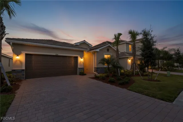 a view of a house with swimming pool yard and outdoor seating