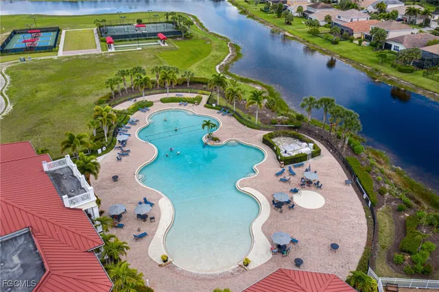 swimming pool with an outdoor space and seating area
