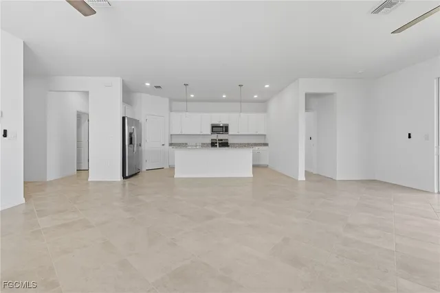 a view of a kitchen with a sink