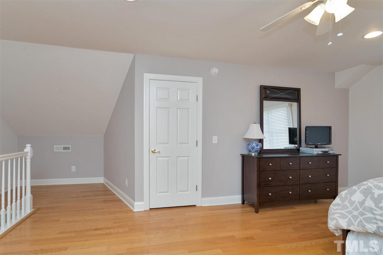 4132 Betterton Drive Raleigh, NC 27613 - Photo 22 of 28 a view of room with furniture and cabinet