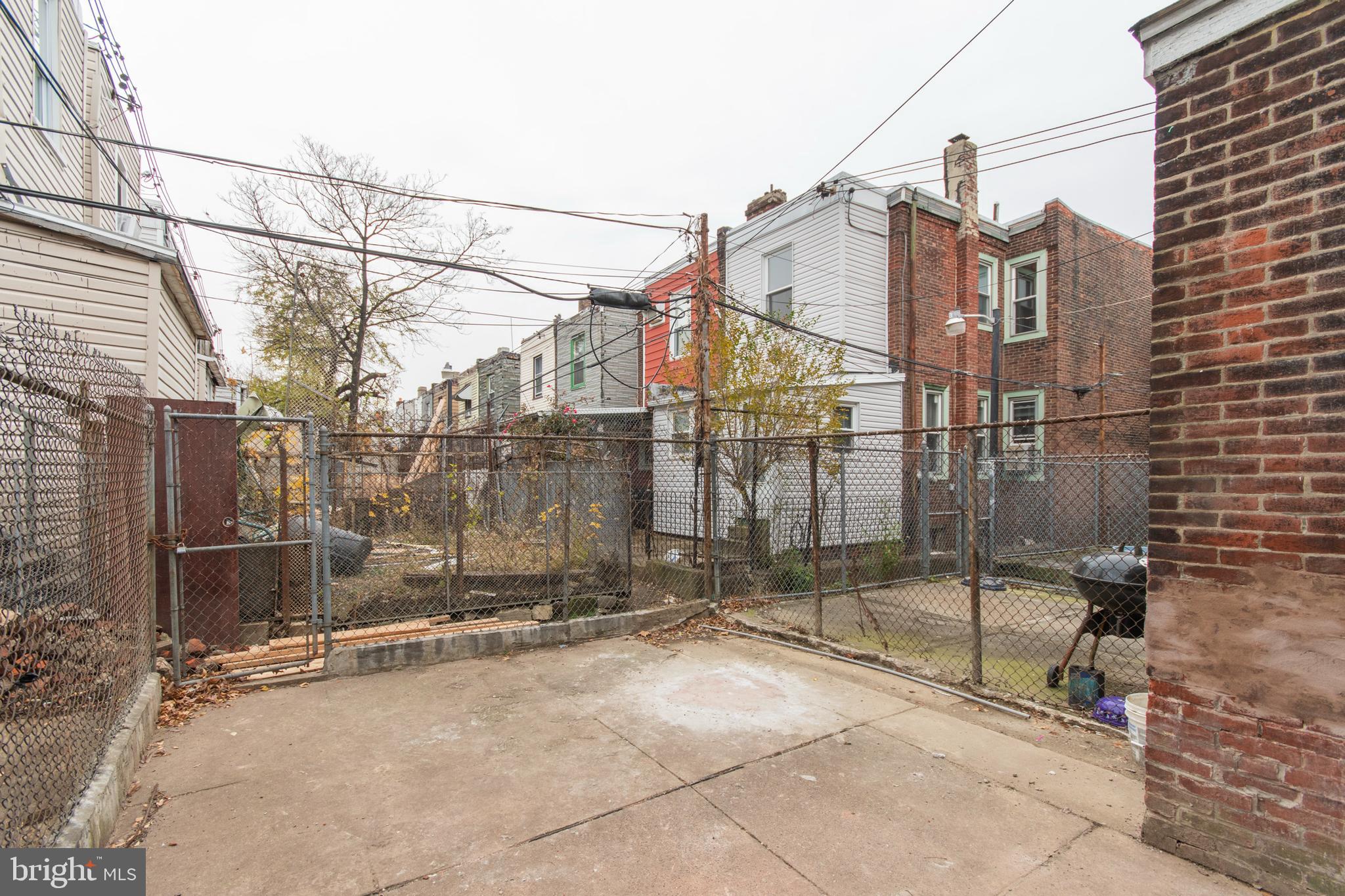 725 West Luzerne Street Philadelphia, PA 19140 - Photo 21 of 23 a view of a house with a street
