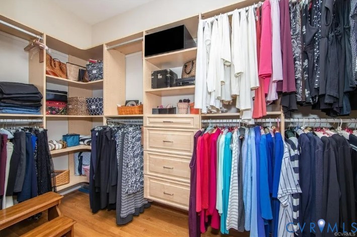 1638 Fallen Timber Trail Powhatan, VA 23139 - Photo 24 of 48 a view of walk in closet with clothes and shoes