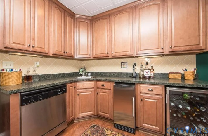 1638 Fallen Timber Trail Powhatan, VA 23139 - Photo 38 of 48 a kitchen with granite countertop cabinets stainless steel appliances and a counter space