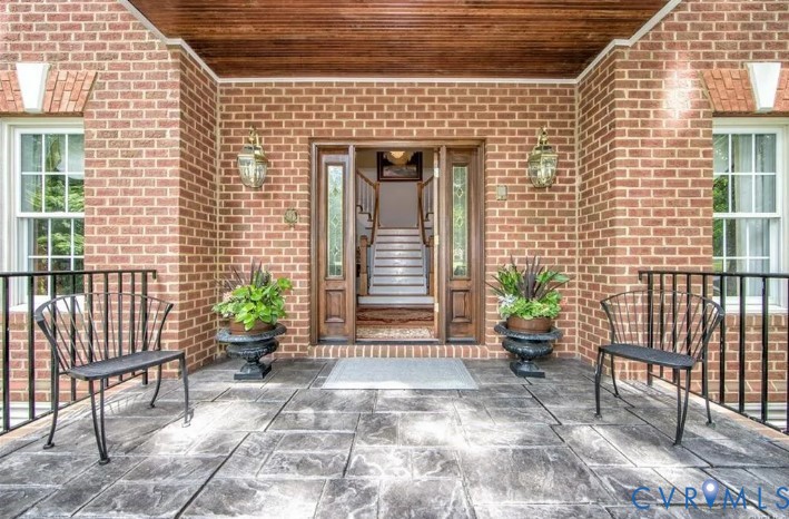 1638 Fallen Timber Trail Powhatan, VA 23139 - Photo 4 of 48 a front view of a house with chairs