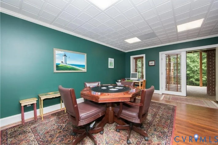 1638 Fallen Timber Trail Powhatan, VA 23139 - Photo 42 of 48 a dining room with furniture a rug and a large window