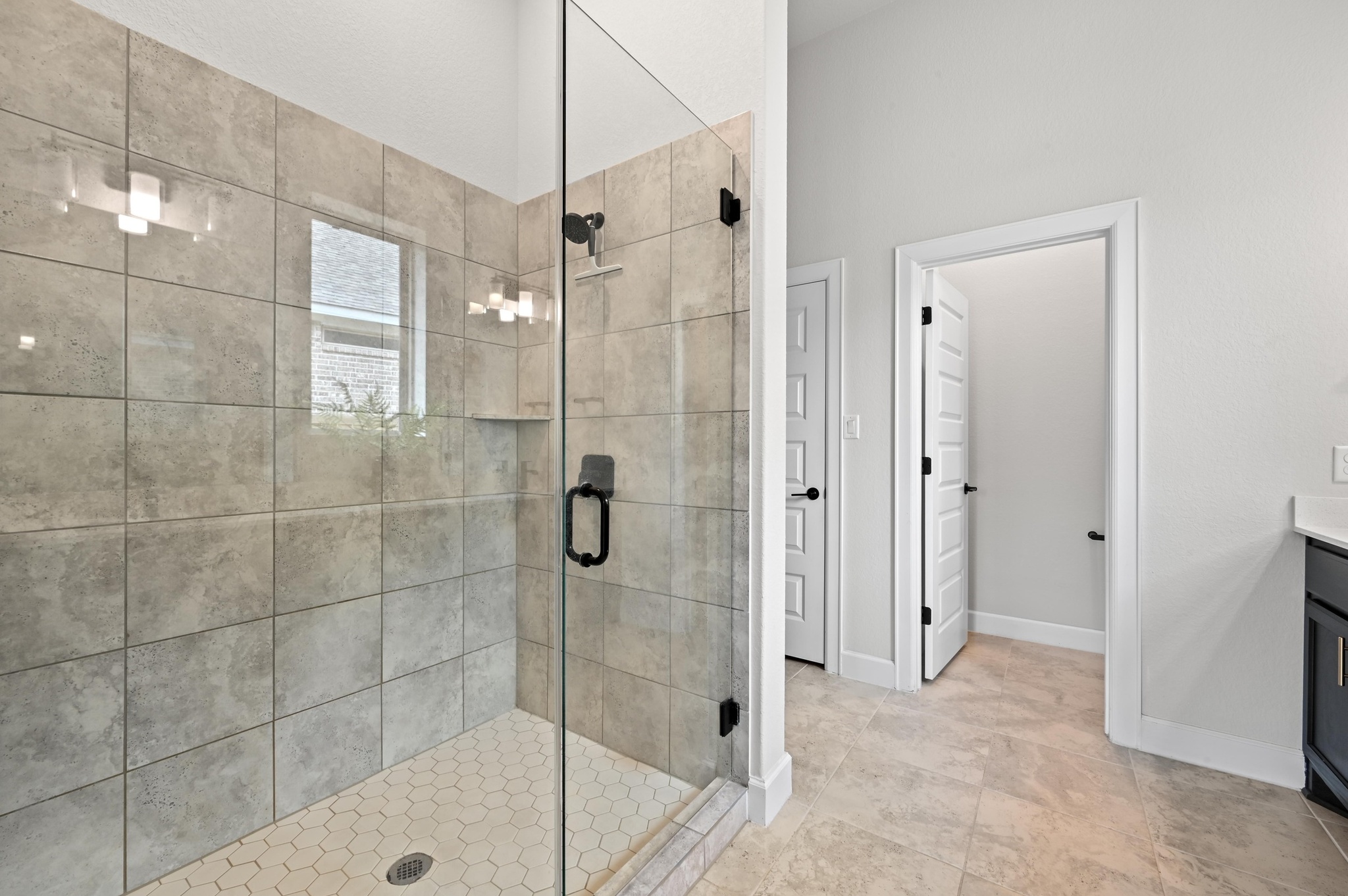 308 Allegheny Way Kyle, TX 78640 - Photo 18 of 40 a bathroom with a shower and a sink