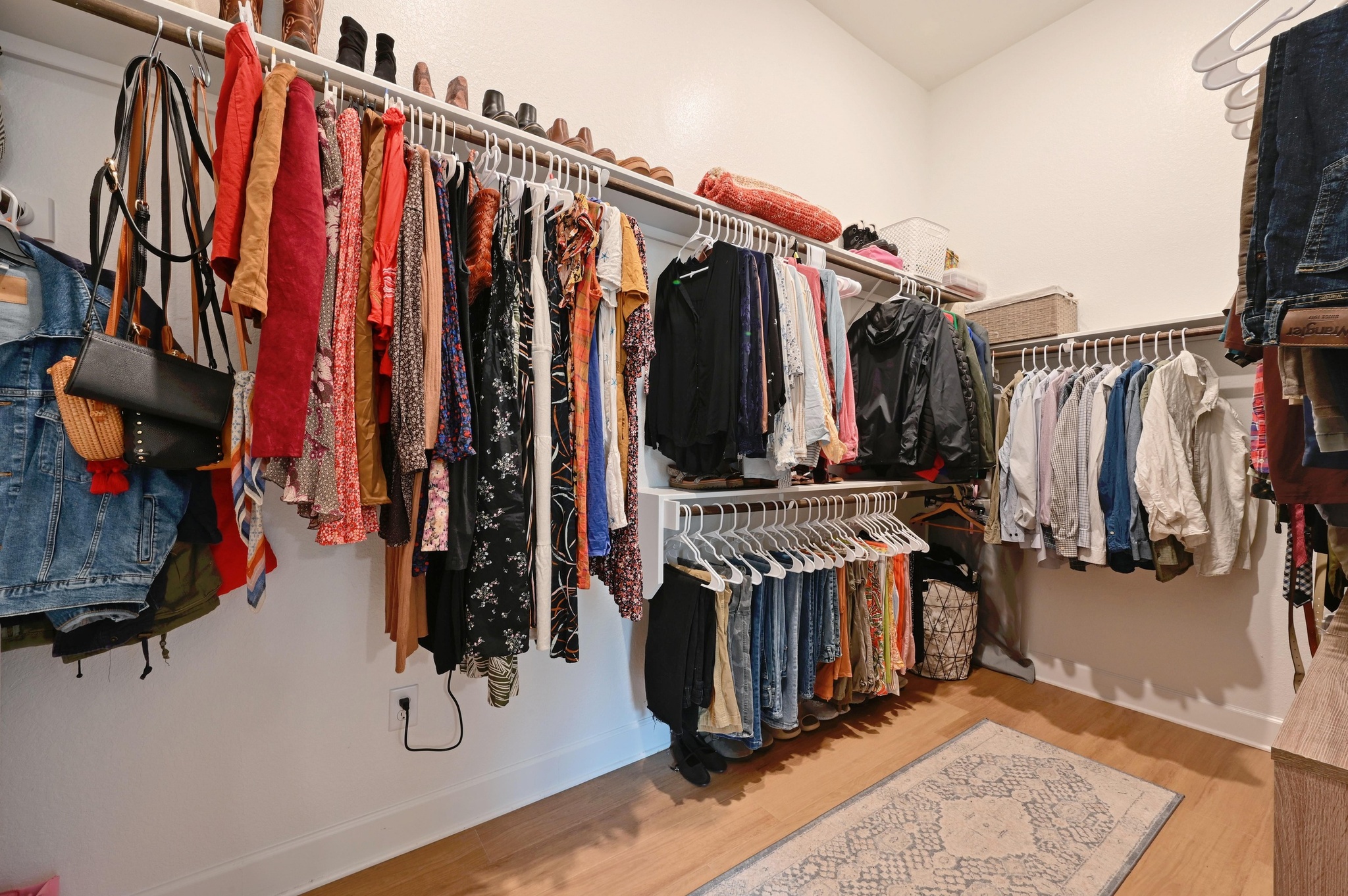 308 Allegheny Way Kyle, TX 78640 - Photo 19 of 40 a view of walk in closet with clothes and shoes
