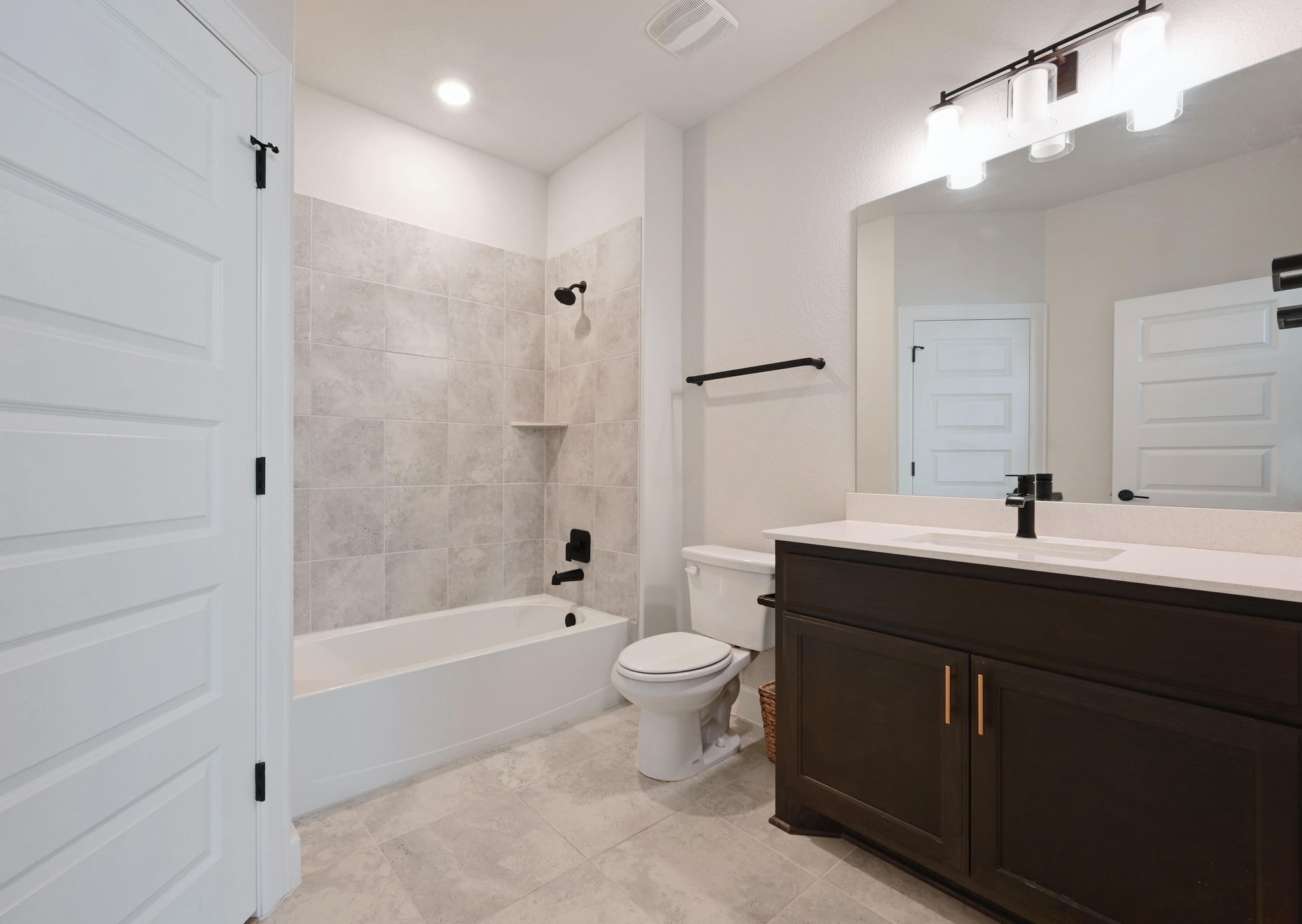 308 Allegheny Way Kyle, TX 78640 - Photo 24 of 40 a bathroom with a bathtub shower sink vanity and toilet