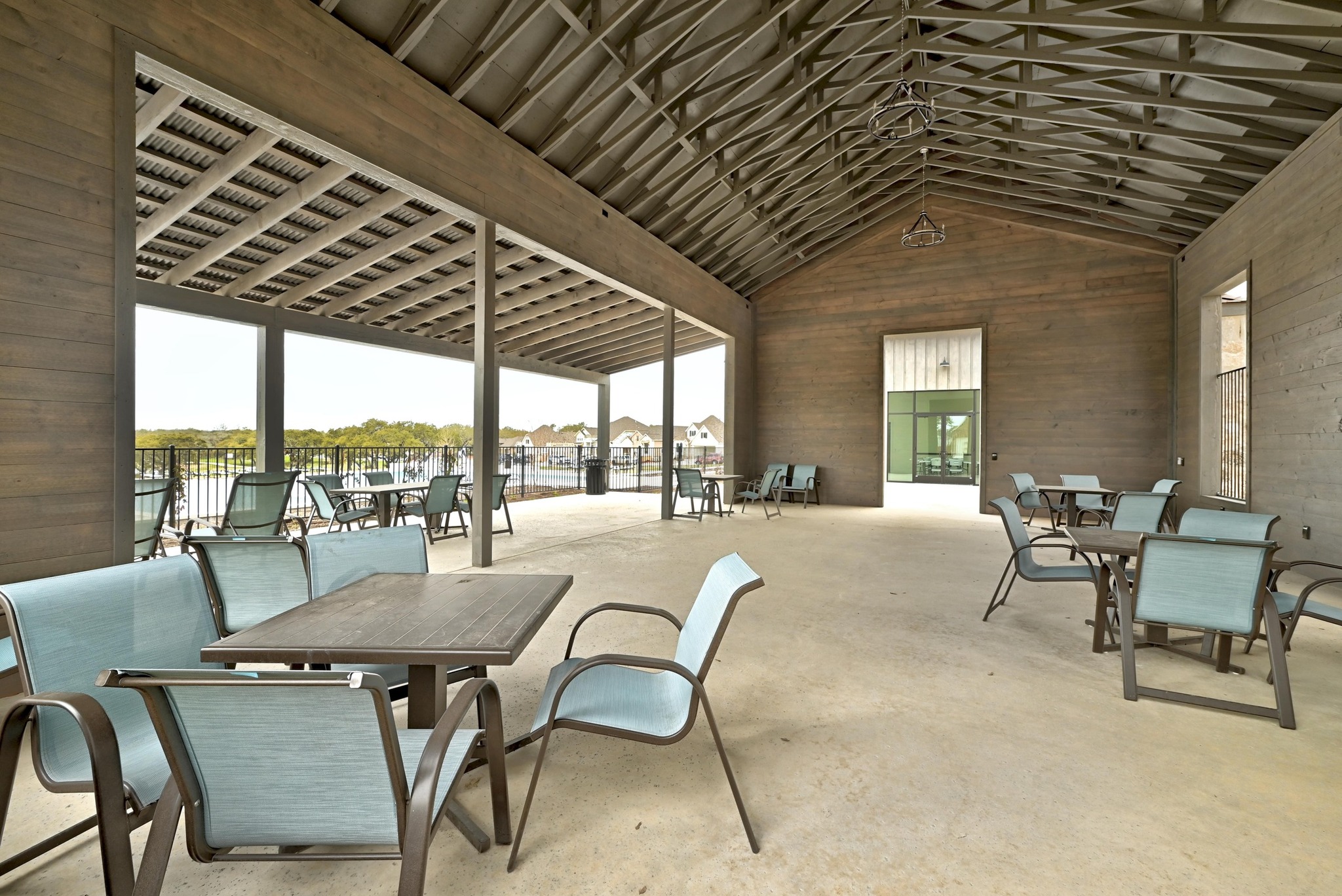 308 Allegheny Way Kyle, TX 78640 - Photo 33 of 40 a view of a patio with swimming pool table and chairs