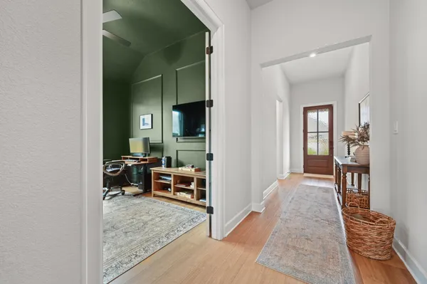 a living room with furniture and a table