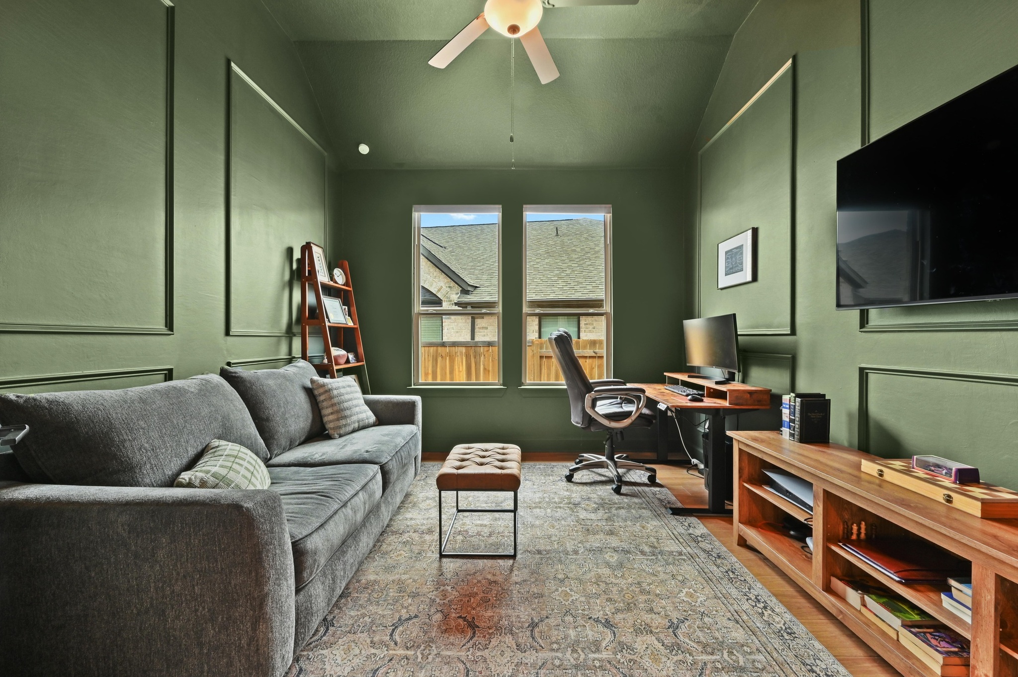 308 Allegheny Way Kyle, TX 78640 - Photo 6 of 40 a living room with furniture and a flat screen tv