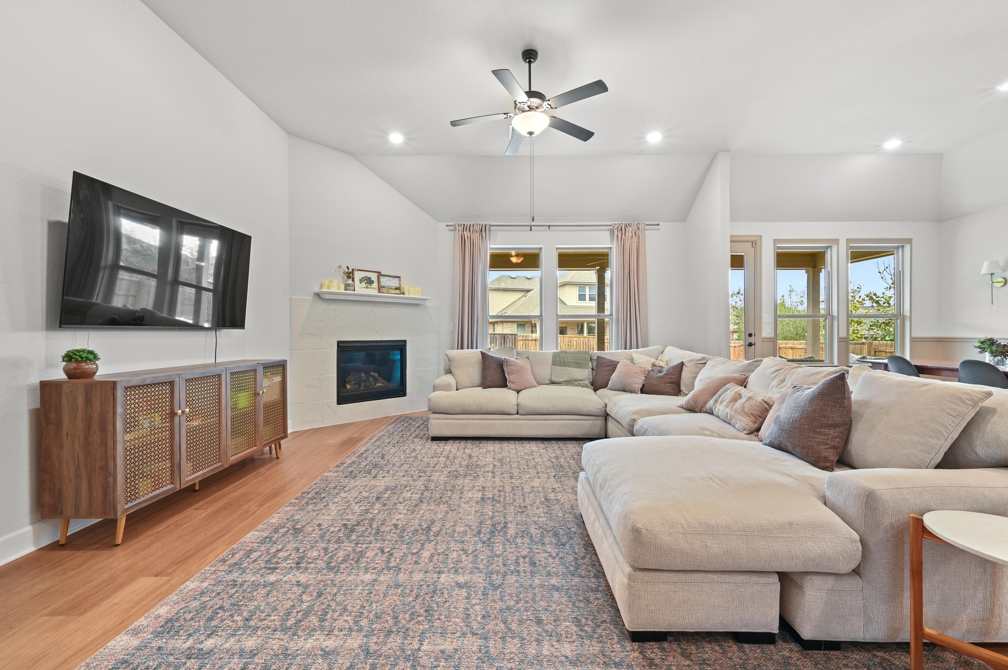 308 Allegheny Way Kyle, TX 78640 - Photo 9 of 40 a living room with furniture and a flat screen tv