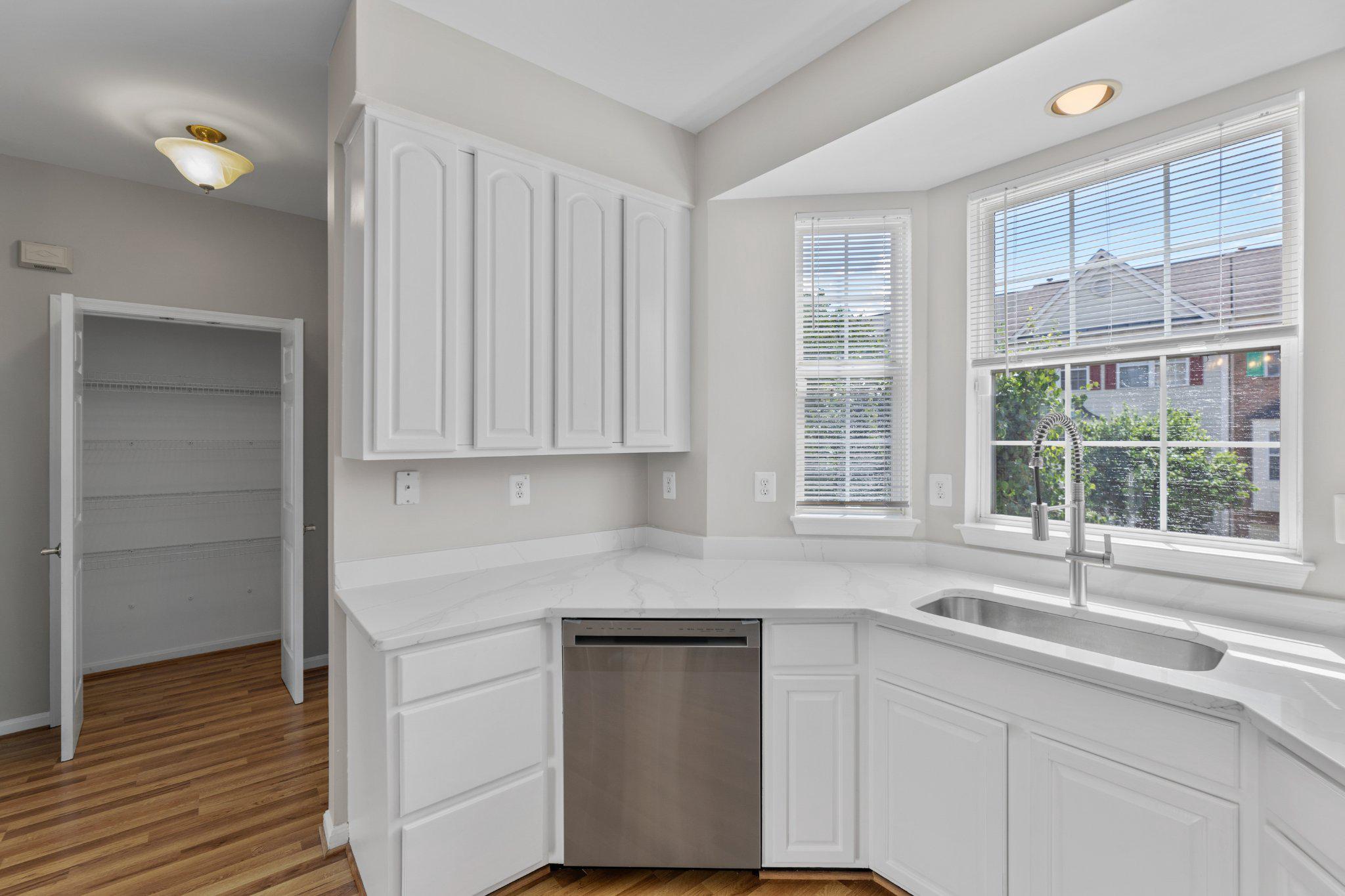9241 Lorton Valley Road Lorton, VA 22079 - Photo 16 of 45 White painted Pantry and Kitchen Cabinets.