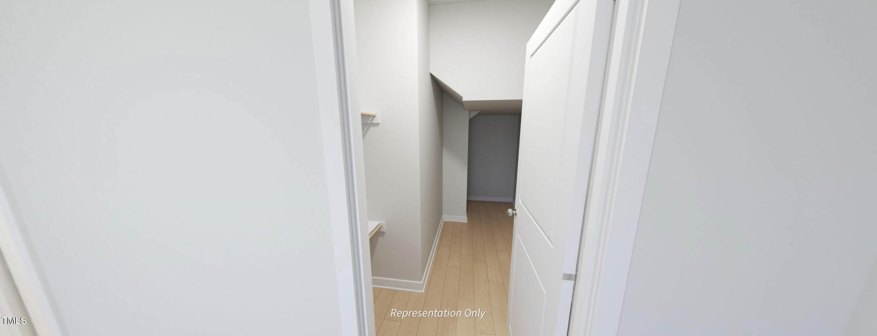 8733 Maxine Street Willow Spring, NC 27592 - Photo 28 of 34 a view of a bathroom from a hallway