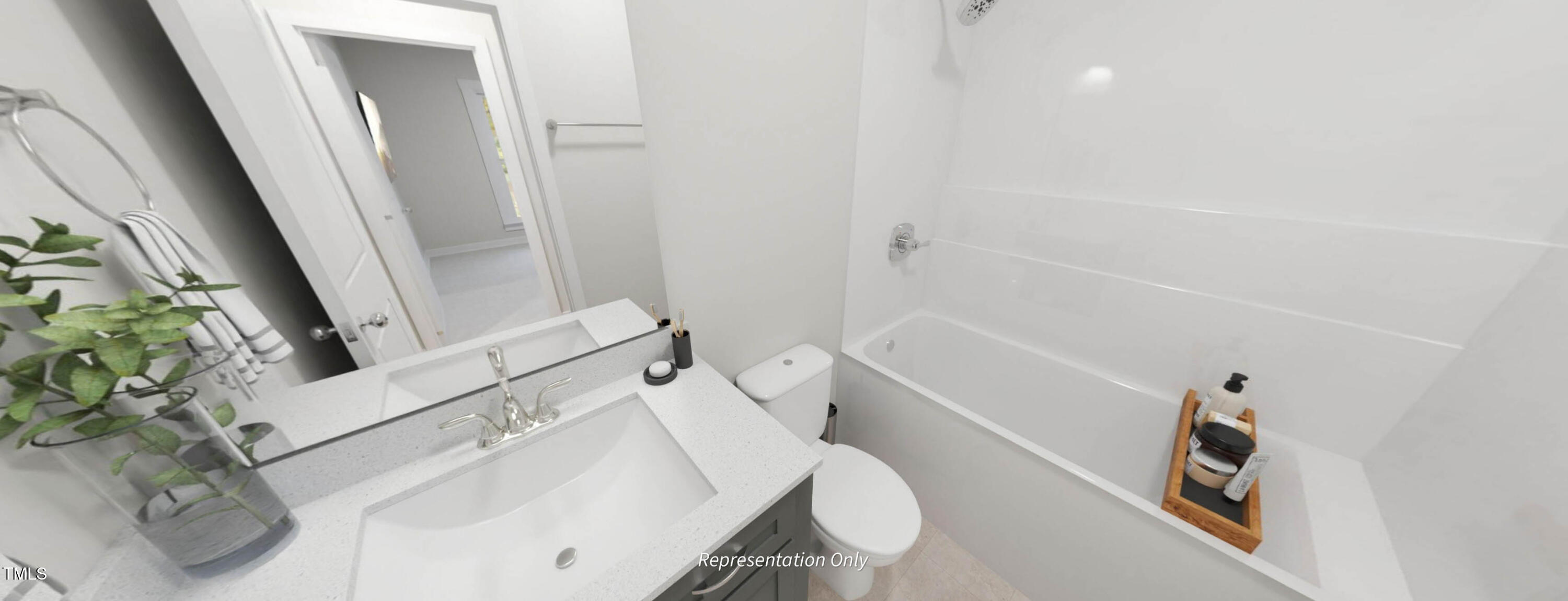 8733 Maxine Street Willow Spring, NC 27592 - Photo 29 of 34 a bathroom with a sink a toilet and shower