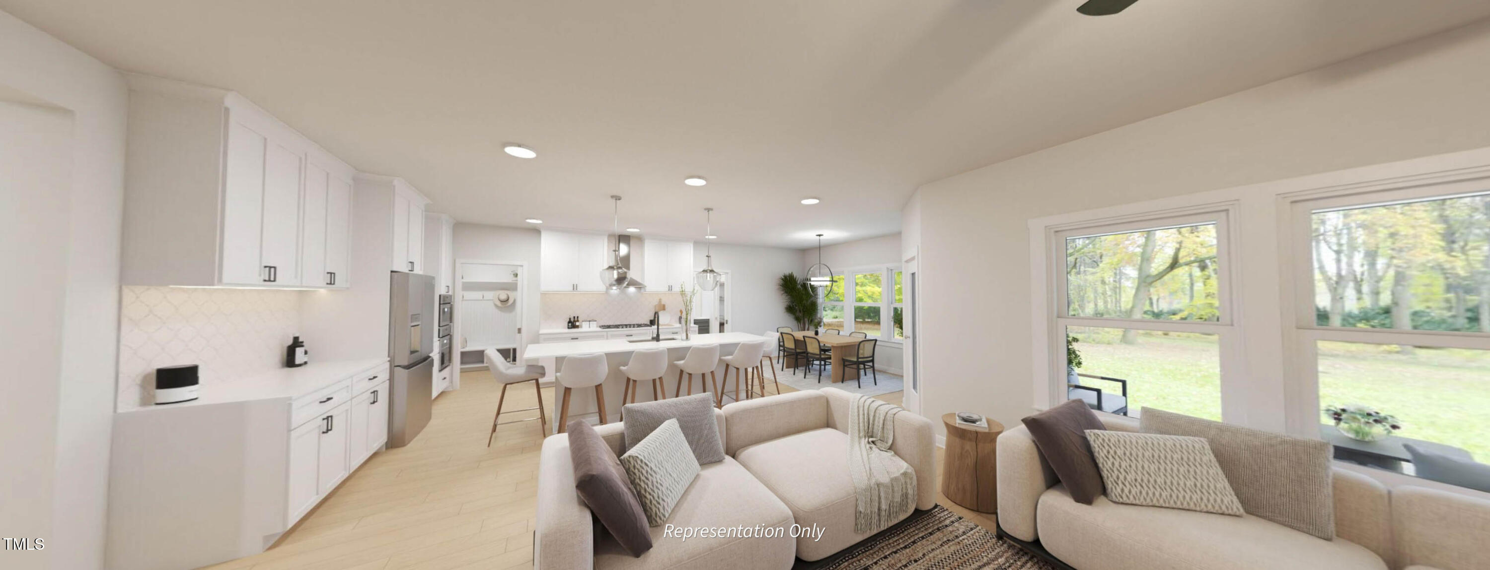 8733 Maxine Street Willow Spring, NC 27592 - Photo 3 of 34 a living room with furniture white walls and a large window