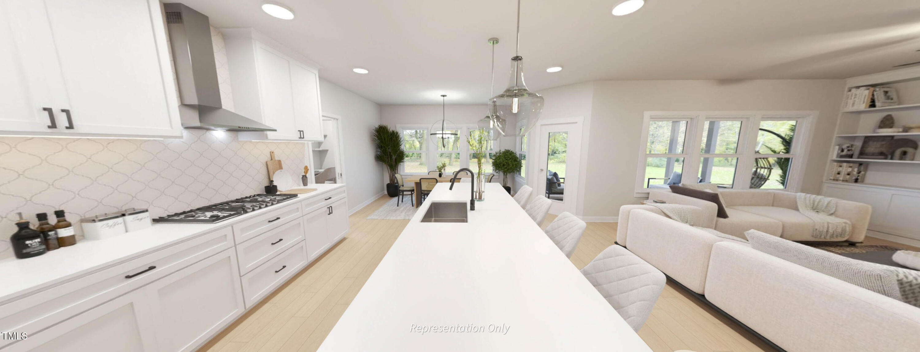 8733 Maxine Street Willow Spring, NC 27592 - Photo 5 of 34 a large white kitchen with lots of counter space