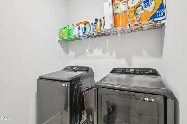 a view of backyard of house and deck