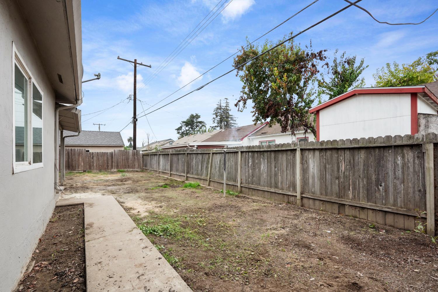 322 West Turner Road Lodi, CA 95240 - Photo 14 of 16 a view of a backyard of the house