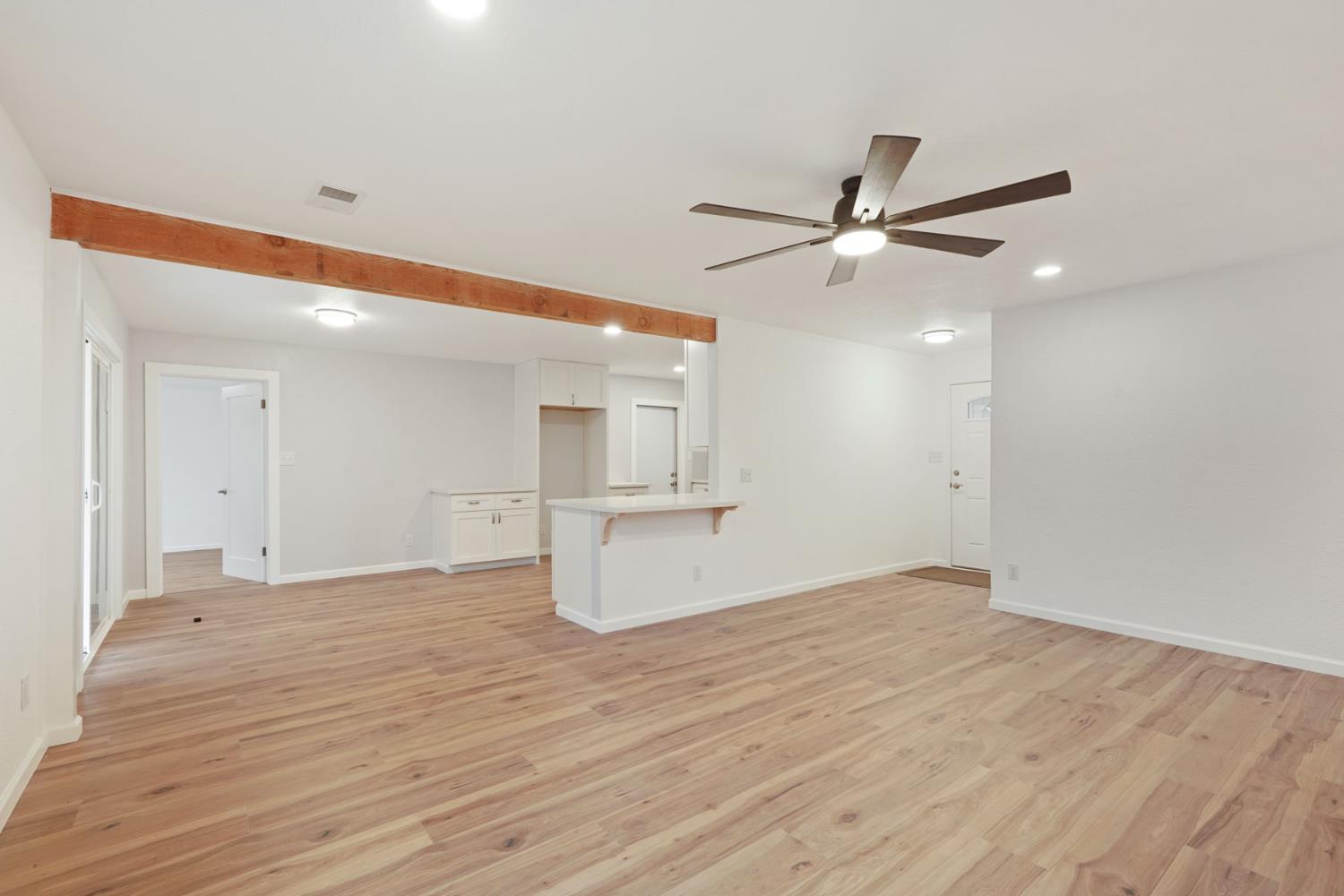 322 West Turner Road Lodi, CA 95240 - Photo 5 of 16 a view of an empty room with a ceiling fan